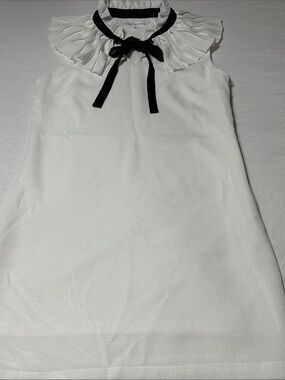 Ruffled Collar Sleeveless Mini Dress in White with Black Ribbon